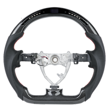 Laden Sie das Bild in den Galerie-Viewer, Carbon fiber steering wheel LED smart version for Toyota FJ Cruiser (2004-2017)